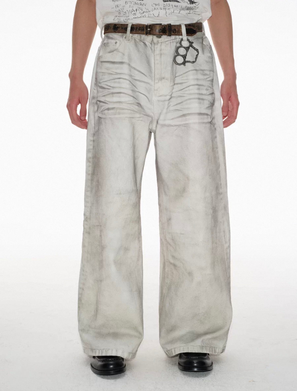 Dirty-dyed vintage white denim, natural dirty wash finish, pre-cat whisker crease detailing, straight wide-leg cut.